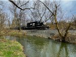 Train symbol H75 alongside Monocacy Creek in Archibald Johnson Conservation Area